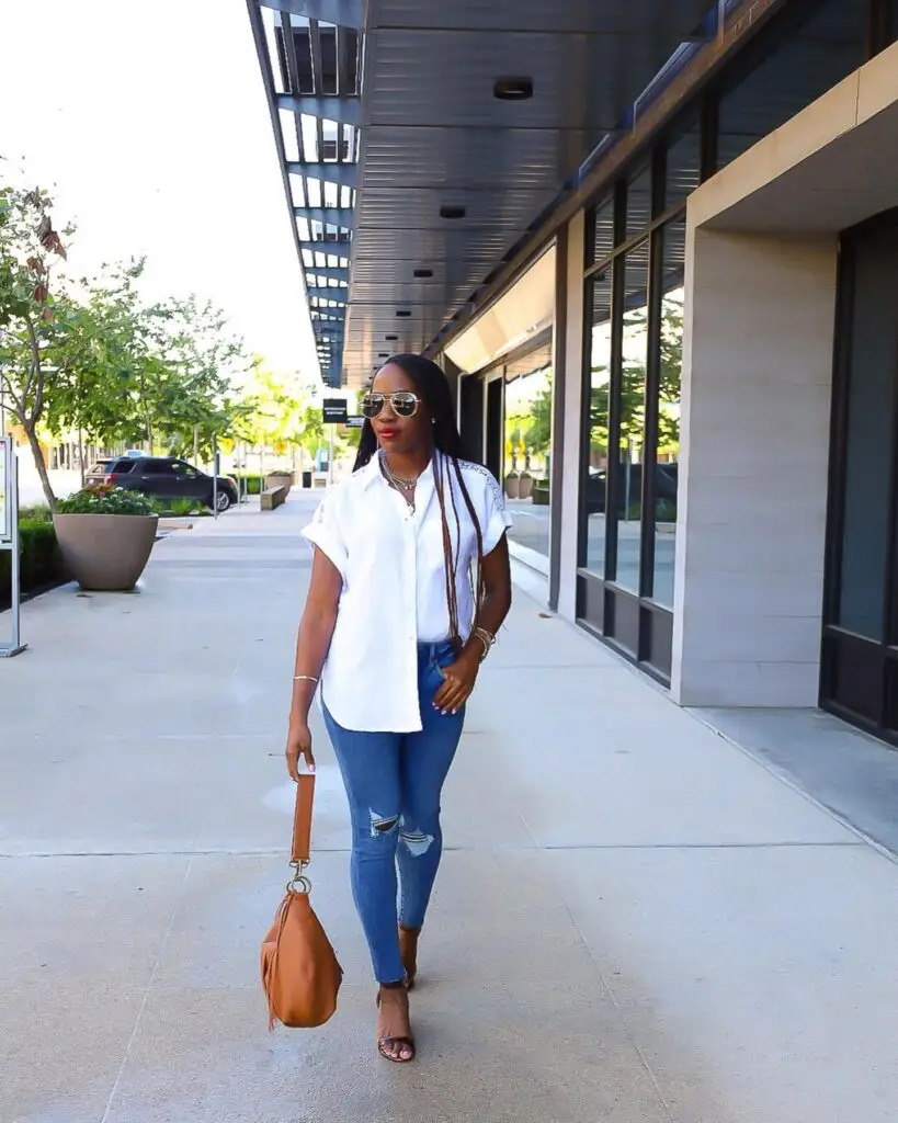 This particular linen top has a small lace panel detail on the back that elevates it just enough without feeling fussy, paired here with distressed denim, a cognac hobo bag, and mirrored aviators for a little extra polish.